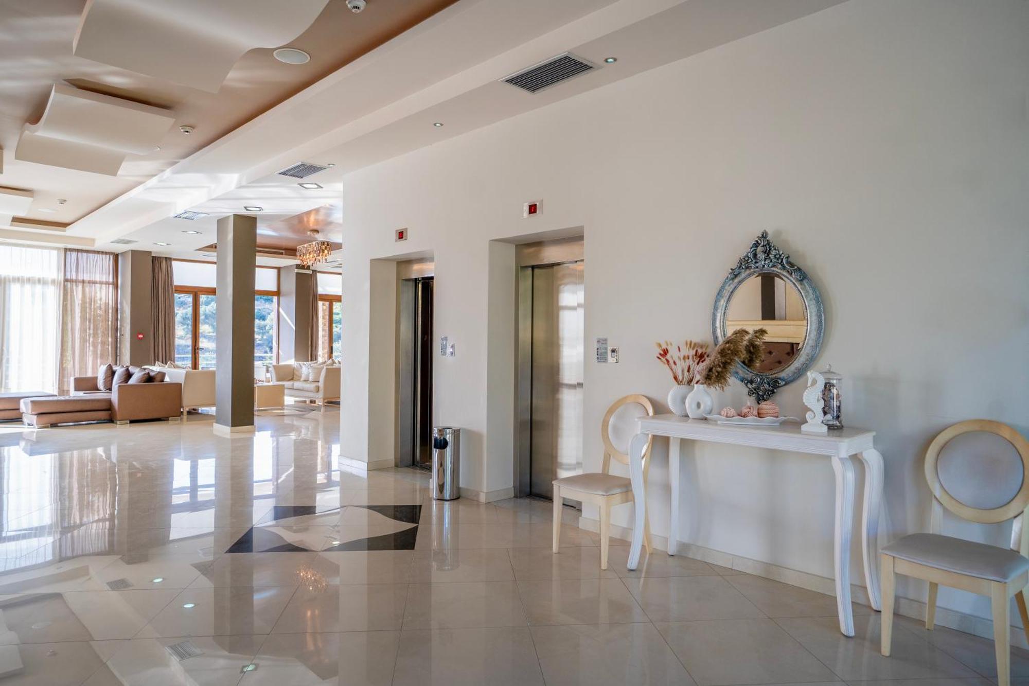 Evia Hotel & Suites Marmari  Экстерьер фото