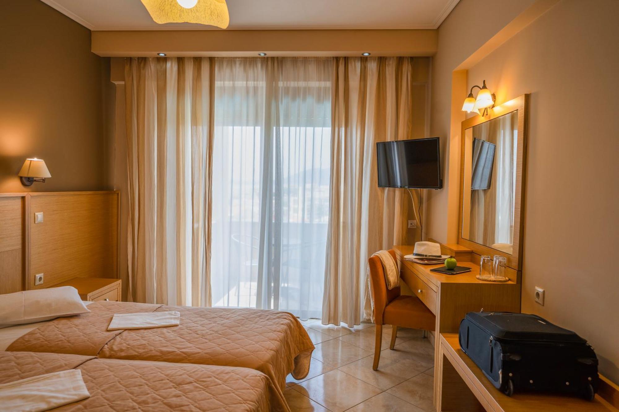 Evia Hotel & Suites Marmari  Экстерьер фото