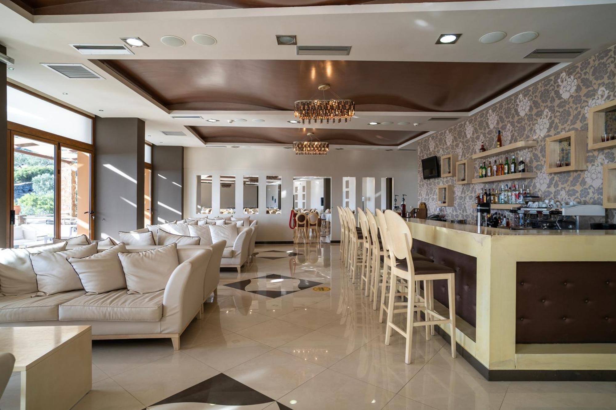Evia Hotel & Suites Marmari  Экстерьер фото