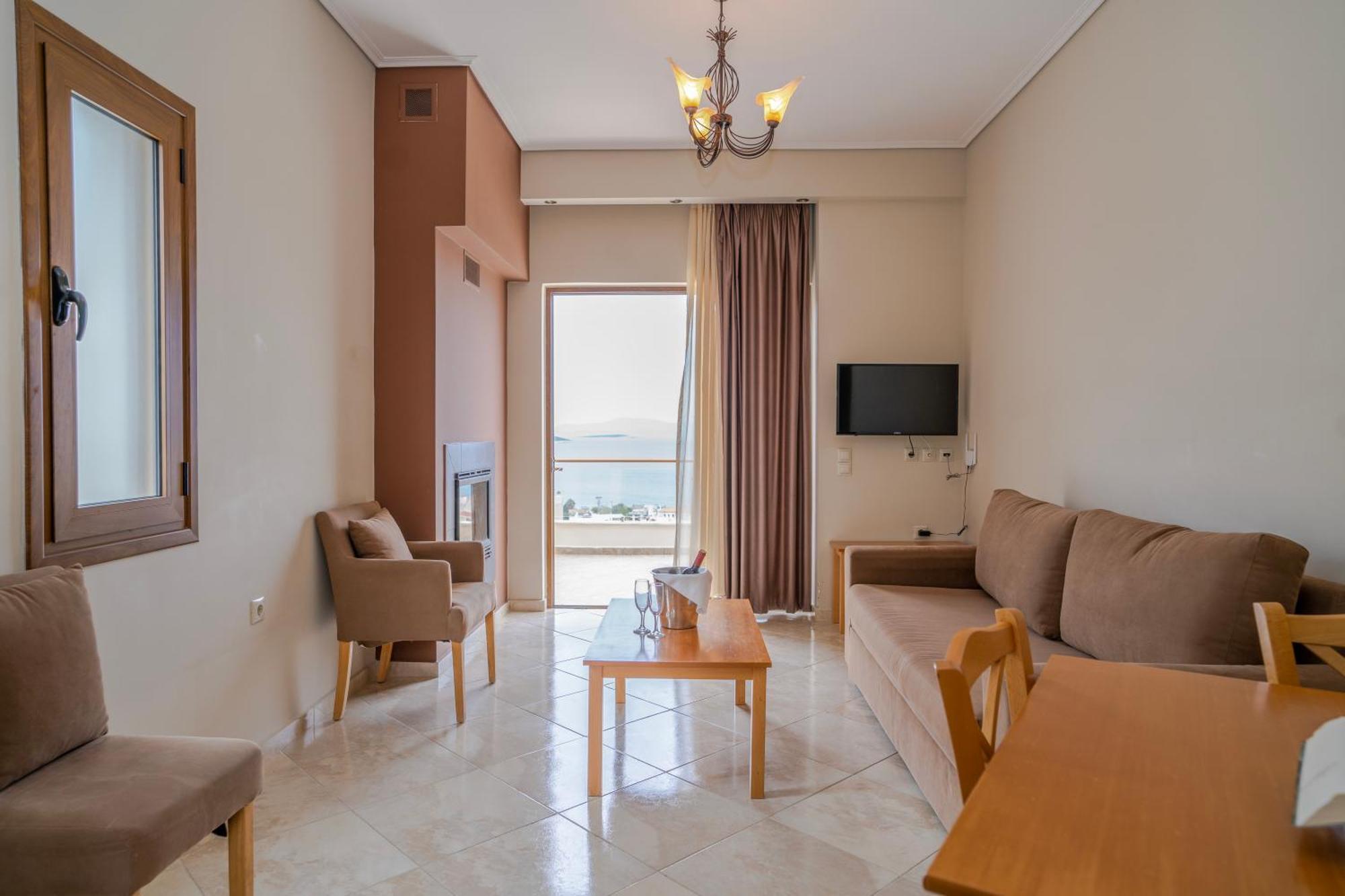 Evia Hotel & Suites Marmari  Экстерьер фото