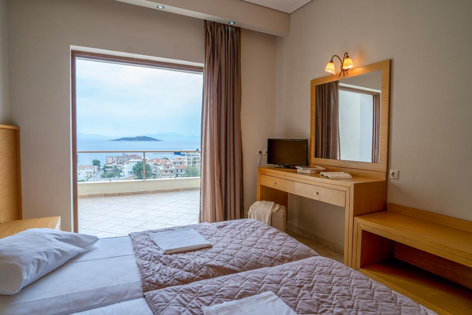 Evia Hotel & Suites Marmari  Экстерьер фото