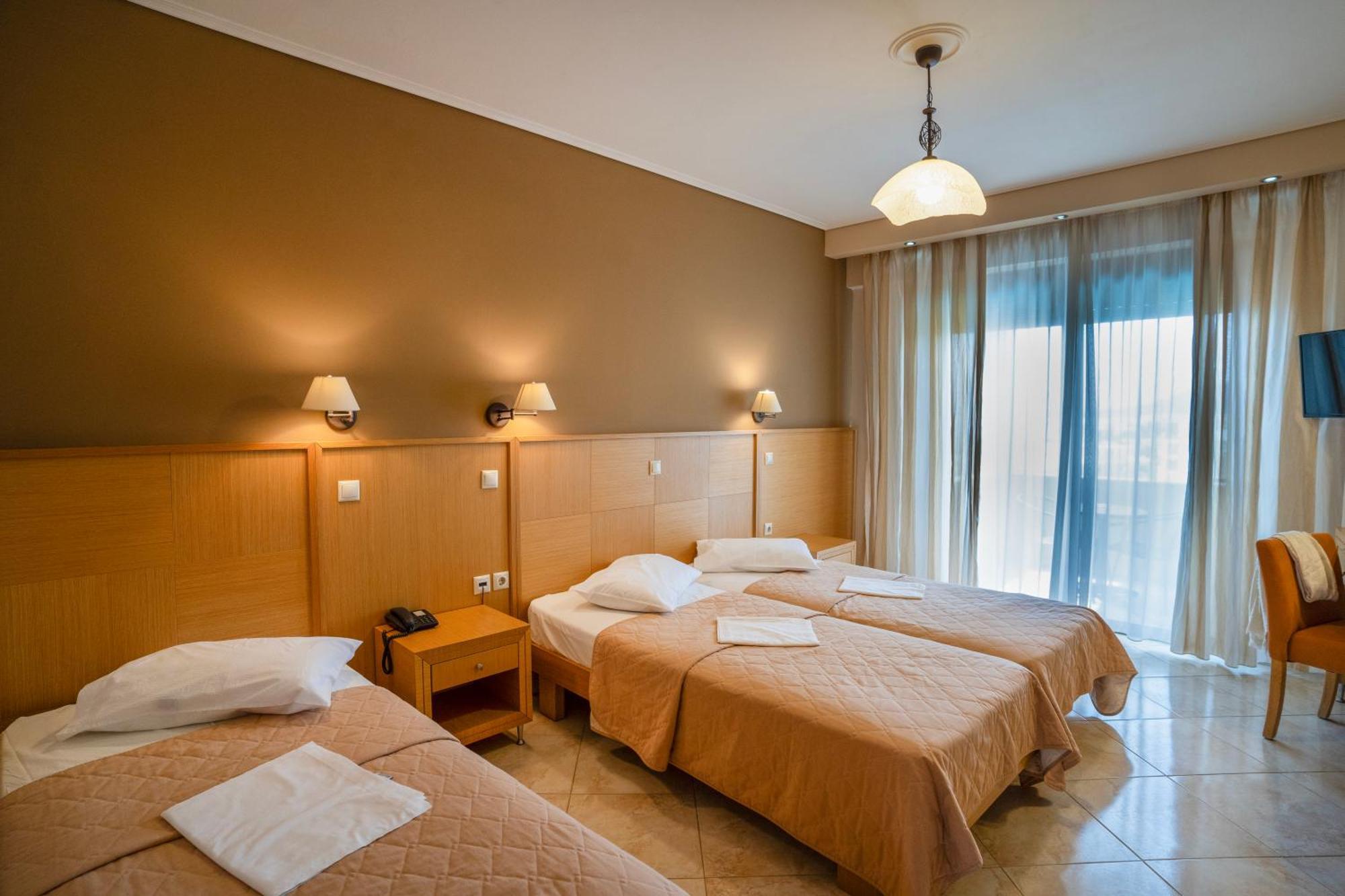 Evia Hotel & Suites Marmari  Экстерьер фото